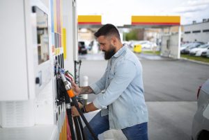 Person spending time gas station